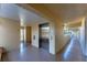 Well-lit corridor with an elevator and neutral colored walls and floor at 934 Wexford Blvd # 934, Venice, FL 34293