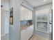 Bright kitchen featuring white cabinets, stainless steel appliances, and granite countertops at 934 Wexford Blvd # 934, Venice, FL 34293