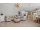 Inviting living space with open layout, kitchen access, and casual dining area at 1028 Grouse Way, Venice, FL 34285