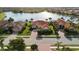 Aerial perspective showing a single-Gathering home with a brick driveway and well-kept front yard at 109 Montelluna Dr, North Venice, FL 34275