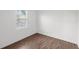 Bedroom features vinyl floors, white walls, and neutral-colored window blinds at 109 Montelluna Dr, North Venice, FL 34275