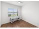 Bedroom with natural light, a desk, and view of a lake at 109 Montelluna Dr, North Venice, FL 34275