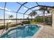 This in-ground pool features a screened enclosure, sunny views and an inviting lounge chair at 109 Montelluna Dr, North Venice, FL 34275