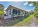 Exterior home view with a private backyard at 121 Auburn Woods Cir, Venice, FL 34292