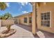 Outdoor patio featuring neutral tones, tiled flooring, and a view of the surrounding landscaping at 121 Auburn Woods Cir, Venice, FL 34292