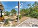 Well-manicured backyard with lush landscaping, a variety of plants, and a serene outdoor setting at 1281 Wilson Dr, Englewood, FL 34224