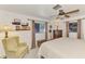 Inviting main bedroom features vintage furnishings, carpet, and plenty of space at 1281 Wilson Dr, Englewood, FL 34224