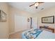 Bedroom featuring a Queen bed, neutral walls, and a mirrored dresser at 13215 Amerigo Ln, Venice, FL 34293
