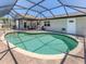 Spacious pool with brick pavers and covered patio at 1340 Olympia Rd, Venice, FL 34293