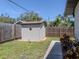 Backyard shed behind a wood fence at 1340 Olympia Rd, Venice, FL 34293