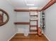 Efficient walk-in closet maximizing storage with well-organized shelving and hanging space at 1340 Olympia Rd, Venice, FL 34293