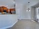 Bright kitchen area with sleek appliances, tile floors, and plenty of counter space at 14352 Pocono Ave, Port Charlotte, FL 33981