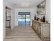 Entry hallway with pool view, art niche and decor at 1503 Marlin St, Nokomis, FL 34275
