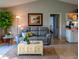 Comfortable living room with stylish sofas, a decorative coffee table, and a cozy atmosphere at 1611 Valley Dr, Venice, FL 34292