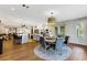 Spacious area featuring the dining room which opens to the kitchen area at 1657 Bayshore Dr, Englewood, FL 34223