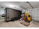 Garage featuring a trailer and forklift at 1657 Bayshore Dr, Englewood, FL 34223