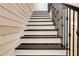 Staircase with a striking black and white design at 1657 Bayshore Dr, Englewood, FL 34223