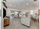 Spacious living area boasting neutral tones, recessed lighting, and an open layout to the kitchen and dining areas at 177 Treviso Ct, North Venice, FL 34275