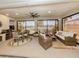 Spacious lanai offers outdoor dining, lounging, and a complete outdoor kitchen at 177 Treviso Ct, North Venice, FL 34275