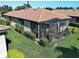 Private backyard with a screened lanai, perfect for relaxing or entertaining guests outdoors at 19124 Mangieri St, Venice, FL 34293