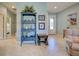 Inviting entryway with tiled floors, a decorative cabinet, and views into adjacent rooms at 19124 Mangieri St, Venice, FL 34293
