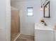 Bathroom features shower with glass door and a modern vanity at 200 Sierra S St, Nokomis, FL 34275
