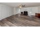 Spacious living room featuring hardwood floors and a ceiling fan at 200 Sierra S St, Nokomis, FL 34275