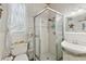 Functional bathroom featuring a shower, unique sink, and bright light at 202 Laurel Oaks Rd, Nokomis, FL 34275