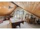 Spacious game room with vaulted ceilings, a pool table, and a seating area at 202 Laurel Oaks Rd, Nokomis, FL 34275