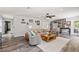 Bright living room featuring stylish decor, a cozy seating arrangement, and an open layout at 202 Laurel Oaks Rd, Nokomis, FL 34275