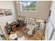 High angle view of living room with wood floors, natural lighting and an entertainment center at 202 Laurel Oaks Rd, Nokomis, FL 34275