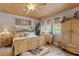 Inviting main bedroom featuring hardwood floors and decorative elements at 202 Laurel Oaks Rd, Nokomis, FL 34275