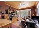 Well-lit office with hardwood floors, built-in shelving, and ample natural light at 202 Laurel Oaks Rd, Nokomis, FL 34275