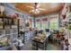 Spacious home office offers ample storage, natural light from three windows, and wood ceiling at 202 Laurel Oaks Rd, Nokomis, FL 34275
