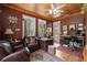 Office space with hardwood floors, natural light, and wooden ceiling at 202 Laurel Oaks Rd, Nokomis, FL 34275