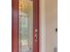 Elegant front door with decorative glass panels and modern hardware at 24128 Spartina Dr, Venice, FL 34293