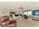 Open floor plan view of living room, kitchen, and water view at 24128 Spartina Dr, Venice, FL 34293