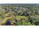 Aerial view of a residence near a serene park and tranquil pond at 2641 Hyde Park St, Sarasota, FL 34239