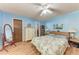 A primary bedroom is spacious with a neutral palette at 2641 Hyde Park St, Sarasota, FL 34239