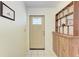 Inviting entryway with light tile floors and warm wooden accents at 2641 Hyde Park St, Sarasota, FL 34239