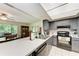 This kitchen shows an island with bar seating and lots of counter space at 2641 Hyde Park St, Sarasota, FL 34239