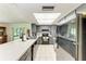 The kitchen shows plentiful cabinet space and a skylight at 2641 Hyde Park St, Sarasota, FL 34239