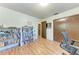 Bright office space with a bookshelf, closet, and natural light at 2641 Hyde Park St, Sarasota, FL 34239