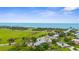 Aerial view of homes near the coast line at 304 Beach Rd, Venice, FL 34285