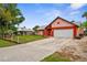 Inviting home with a spacious driveway, attached garage, and a vibrant, well-maintained lawn at 304 Beach Rd, Venice, FL 34285