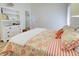 Well-appointed bedroom featuring built-in shelving and a comfortable bed, creating a serene and organized retreat at 3192 Pinetree St, Port Charlotte, FL 33952