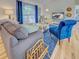 Cozy living room features bright window with natural light, comfortable seating, and modern decor at 3192 Pinetree St, Port Charlotte, FL 33952