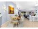 Elegant dining area with views of the living room and kitchen, enhancing the open concept layout at 3419 Lakewood Blvd, North Port, FL 34287