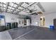 Organized garage with epoxy flooring, storage solutions, and ample space at 3419 Lakewood Blvd, North Port, FL 34287