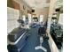 Community gym is equipped with modern exercise equipment and ample natural light at 3419 Lakewood Blvd, North Port, FL 34287